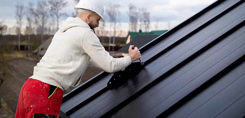 Tin Roof Ridge Cap Installation in Oceanside